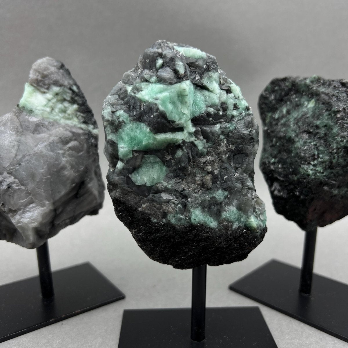 Raw Emerald Specimen on Metal Stand — Rare Crystal Display