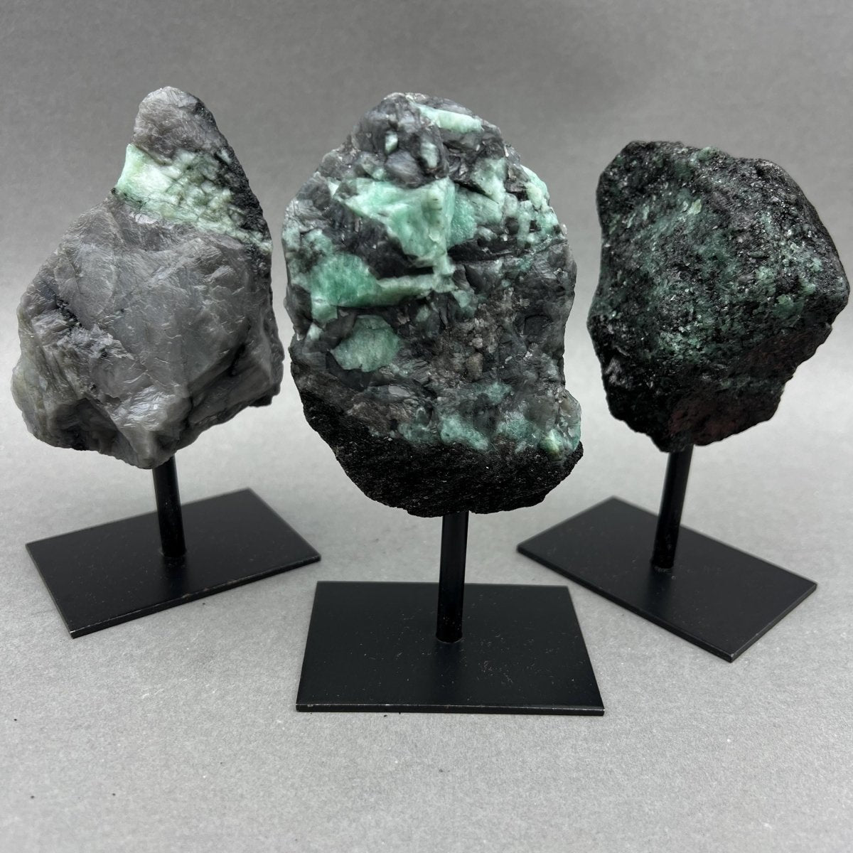 Raw Emerald Specimen on Metal Stand — Rare Crystal Display